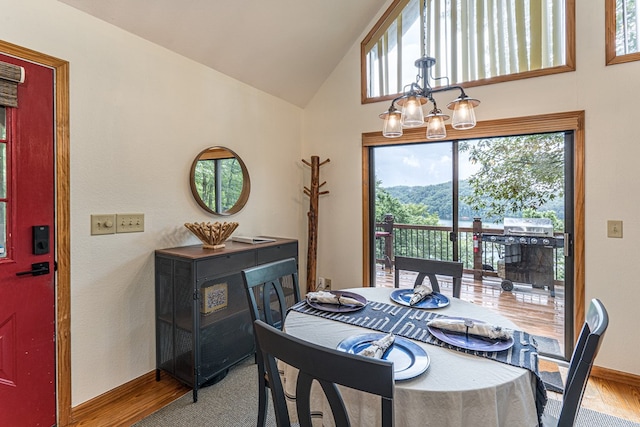 40 White Cloud Dr, Murphy, NC 28906 - dining area featuring wood finished floors and high vaulted ceiling