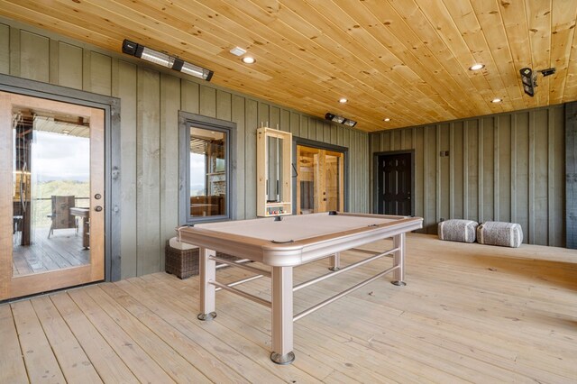 playroom featuring wooden walls, recessed lighting, wood ceiling, and light wood finished floors