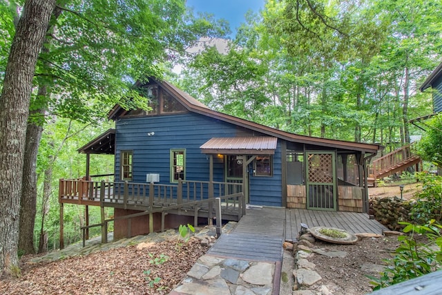 view of front of property featuring a deck