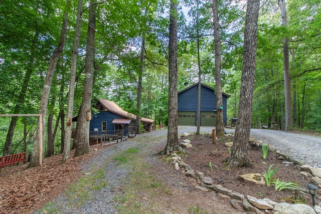 view of property exterior with a garage