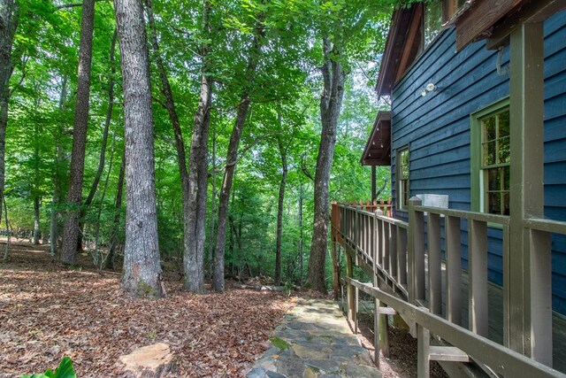 view of yard with a wooden deck