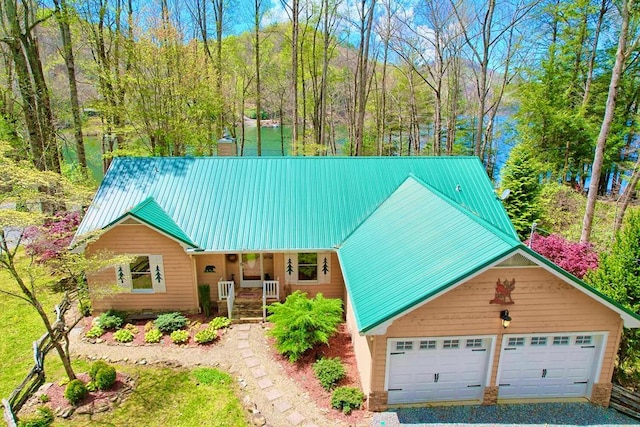 view of front of home with a garage and covered porch