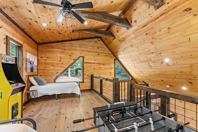 bedroom with vaulted ceiling with beams, wood-type flooring, wood ceiling, and wooden walls