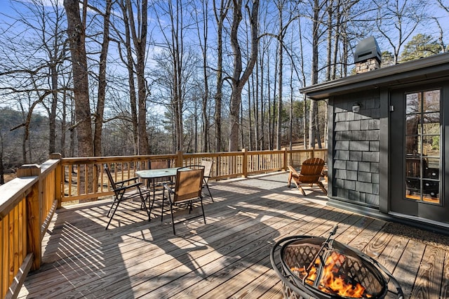 deck with a fire pit