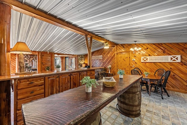 dining area with vaulted ceiling