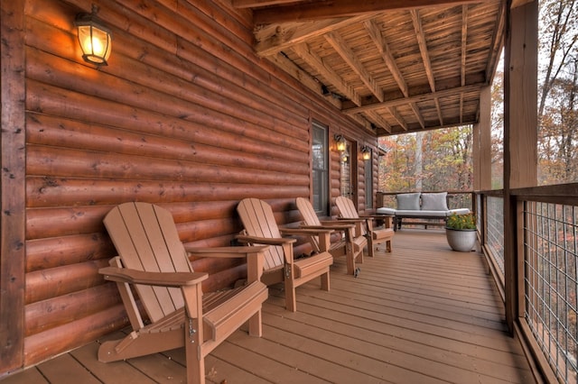 wooden terrace featuring a porch