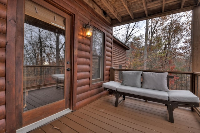 wooden deck with outdoor lounge area