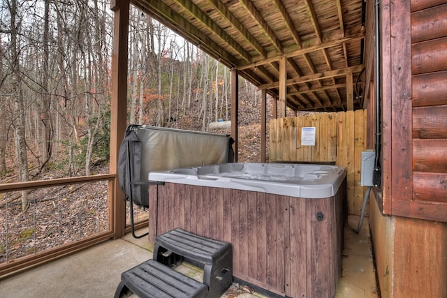 view of patio / terrace with a hot tub