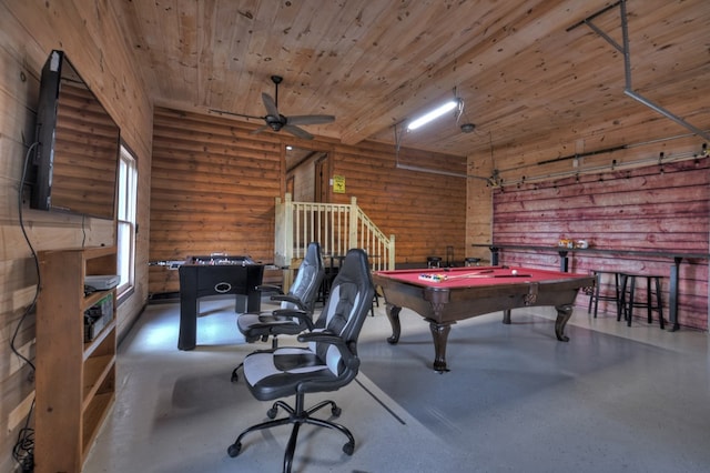 recreation room with ceiling fan, wood ceiling, pool table, and rustic walls