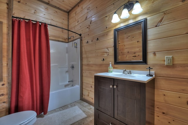 full bathroom with shower / bathtub combination with curtain, tile patterned flooring, wood walls, toilet, and vanity