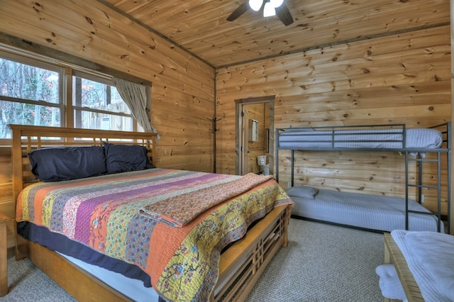 bedroom featuring carpet flooring, ceiling fan, and wooden ceiling