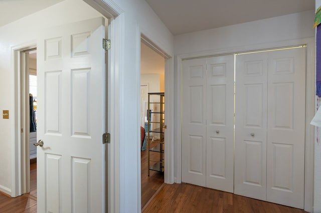 hall featuring wood finished floors