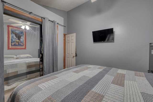 bedroom with a closet and ceiling fan