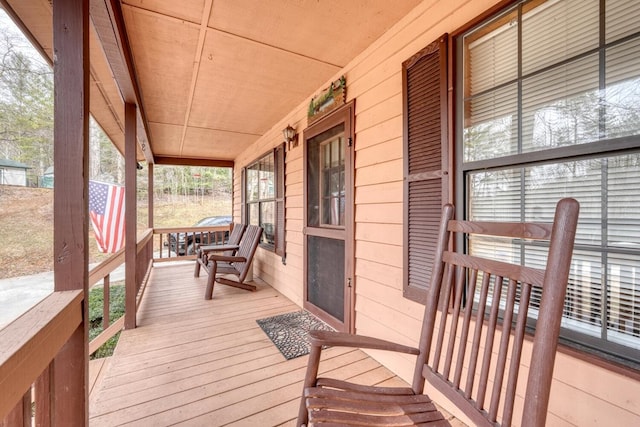 deck with covered porch