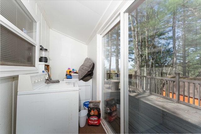 washroom featuring washer and dryer and laundry area