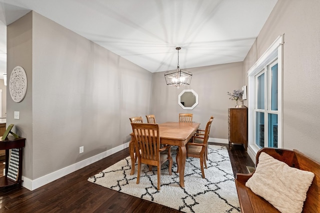 135 Adams Farm Dr, Blairsville, GA 30512 - dining area with hardwood / wood-style floors, baseboards, a chandelier, and vaulted ceiling