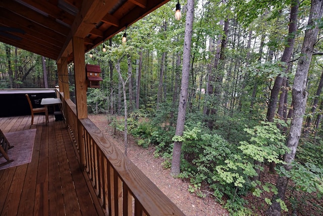 deck with a wooded view