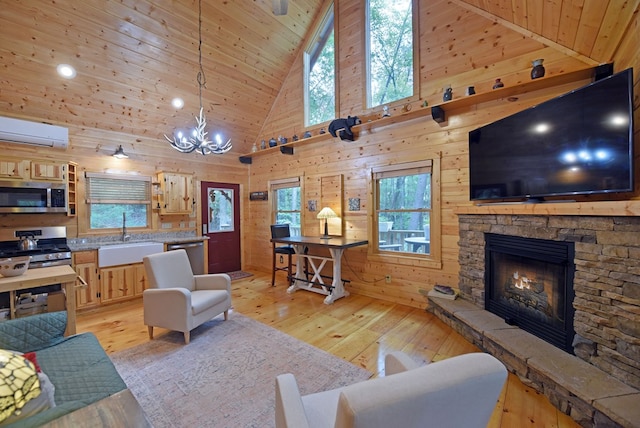 living area featuring an AC wall unit, wood walls, and wooden ceiling