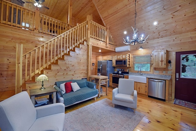 living room with stairway, light wood finished floors, a wall mounted AC, wood ceiling, and wood walls