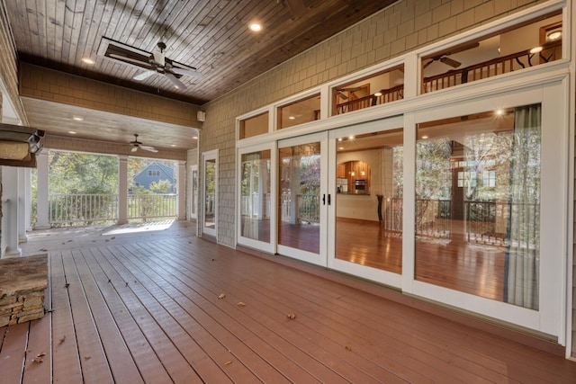 wooden terrace with ceiling fan