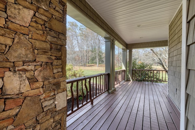 wooden terrace featuring a porch