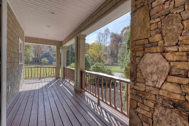 wooden deck featuring covered porch