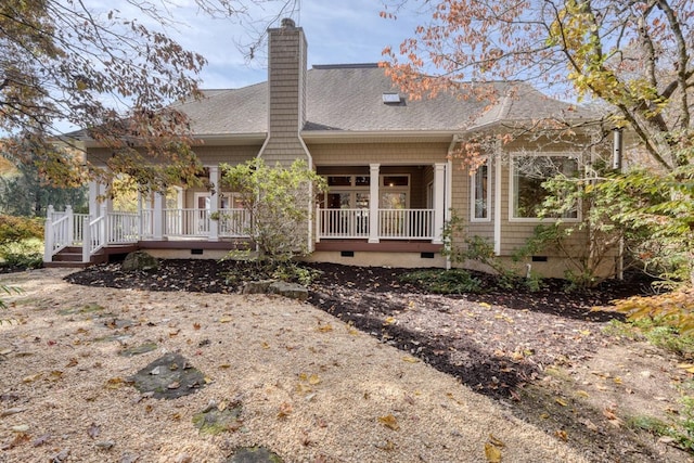 back of house with covered porch