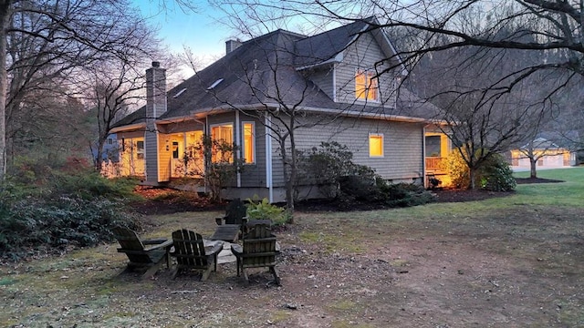 1949 Big Pine Dr, Hiawassee, GA 30546 - back of property featuring a chimney