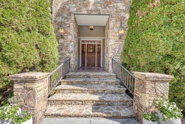 1949 Big Pine Dr, Hiawassee, GA 30546 - entrance to property featuring stone siding and a porch