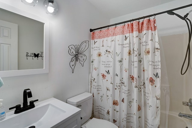 full bathroom featuring toilet, vanity, and shower / bathtub combination with curtain