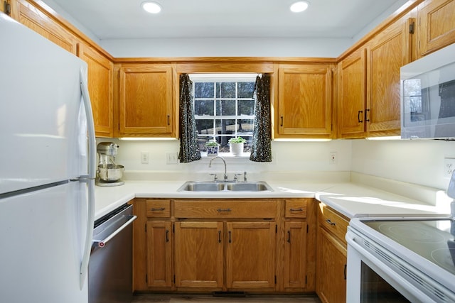 kitchen with sink and white appliances