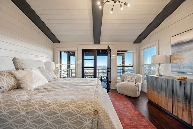 bedroom with access to exterior, dark hardwood / wood-style flooring, lofted ceiling with beams, and multiple windows