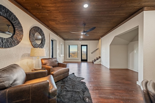 living room featuring wood ceiling, dark wood-type flooring, and ceiling fan