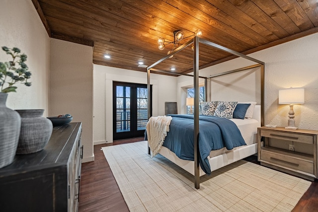 bedroom featuring hardwood / wood-style flooring, wood ceiling, and french doors