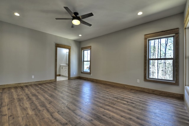 unfurnished room featuring ceiling fan, baseboards, wood finished floors, and recessed lighting