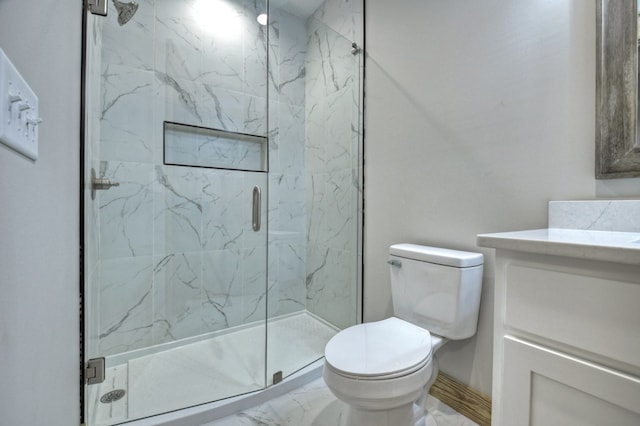 bathroom with a marble finish shower, toilet, marble finish floor, and vanity