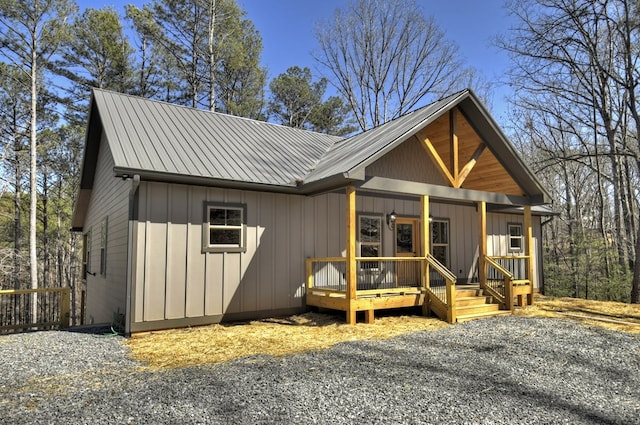 view of front of house featuring covered porch and board and batten siding