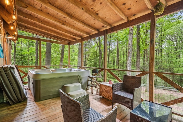85 Clear Lake Ct, Ellijay, GA 30540 - sunroom / solarium featuring a jacuzzi, a forest view, and plenty of natural light