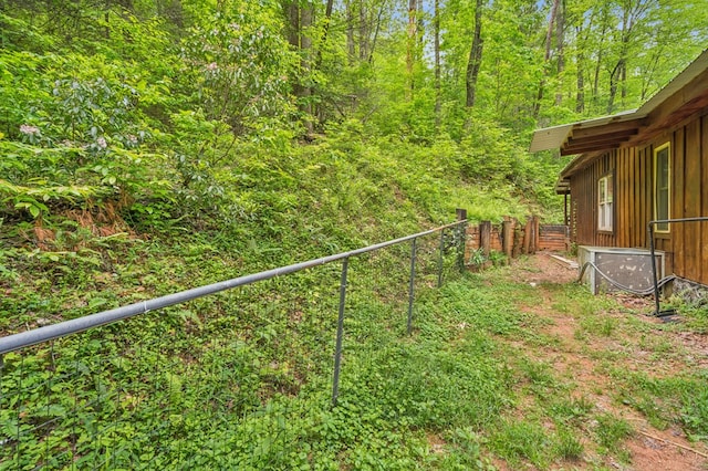 85 Clear Lake Ct, Ellijay, GA 30540 - view of yard with central AC and a wooded view