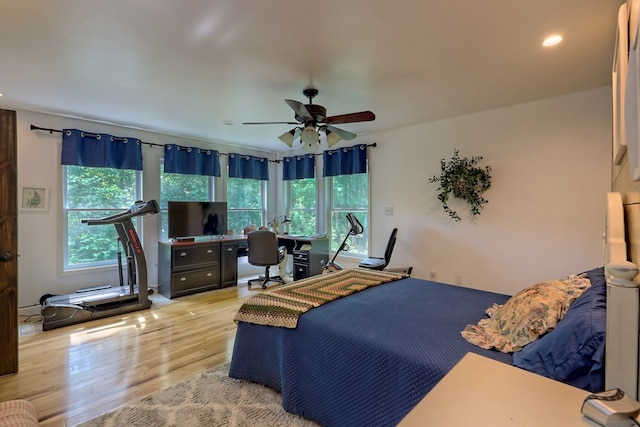 bedroom featuring ceiling fan and light hardwood / wood-style floors