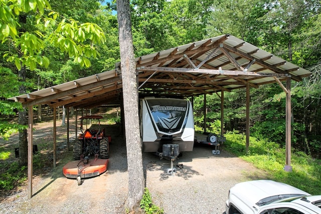 view of car parking featuring a carport