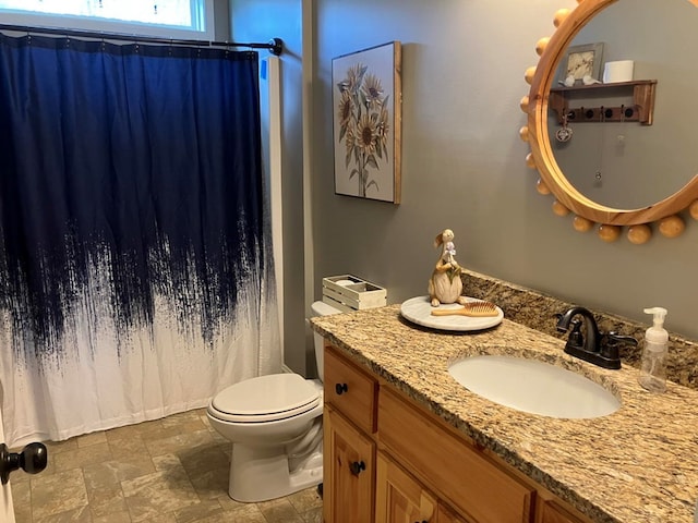 24 Pauls Ct, Blairsville, GA 30512 - bathroom with vanity, stone finish floor, toilet, and a shower with curtain
