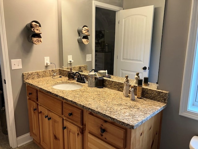 24 Pauls Ct, Blairsville, GA 30512 - bathroom featuring baseboards, toilet, and vanity