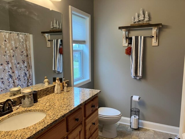 24 Pauls Ct, Blairsville, GA 30512 - bathroom with vanity, a shower with shower curtain, toilet, and baseboards