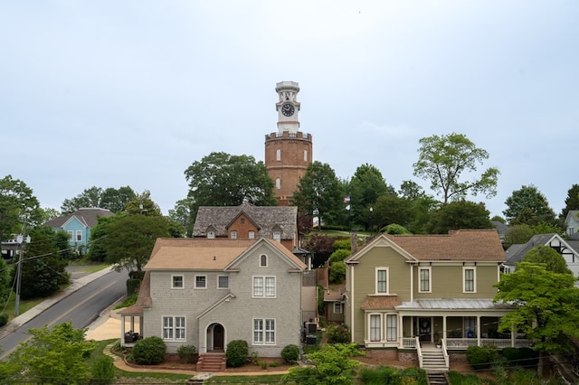 view of front of home featuring a porch and a residential view