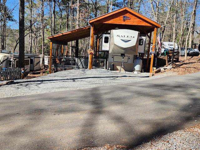 exterior space featuring a detached carport