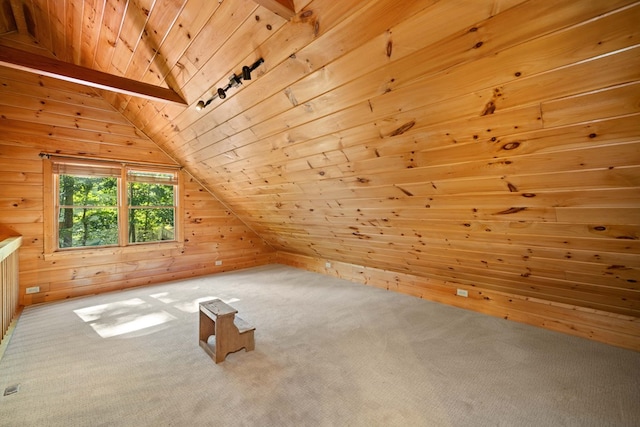 bonus room featuring wood ceiling, lofted ceiling, carpet floors, and wooden walls