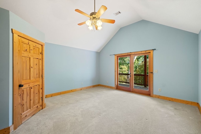 additional living space featuring light colored carpet, ceiling fan, and lofted ceiling