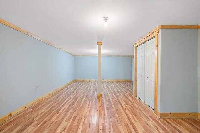 basement featuring light wood-type flooring