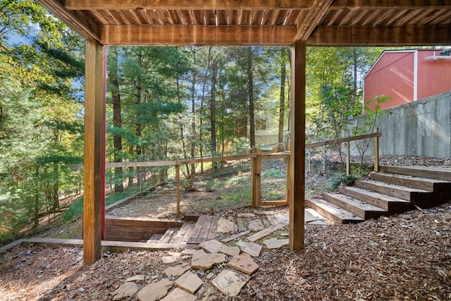 exterior space with wood ceiling